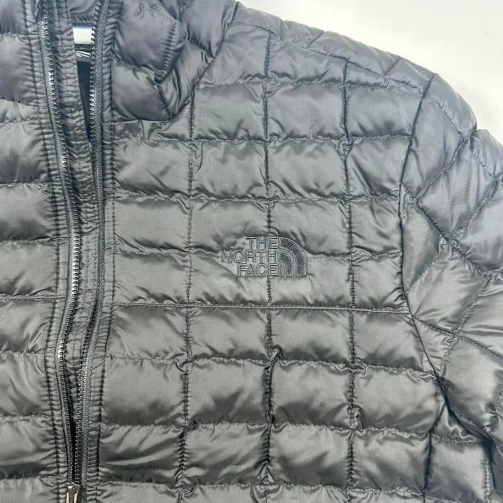 The North Face black puffer jacket